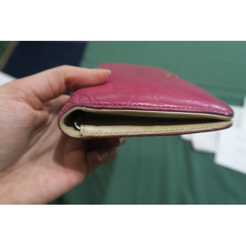 8057 - A Chanel Camellia long wallet in pink lambskin with gold-tone hardware With Chanel authenticity card... 