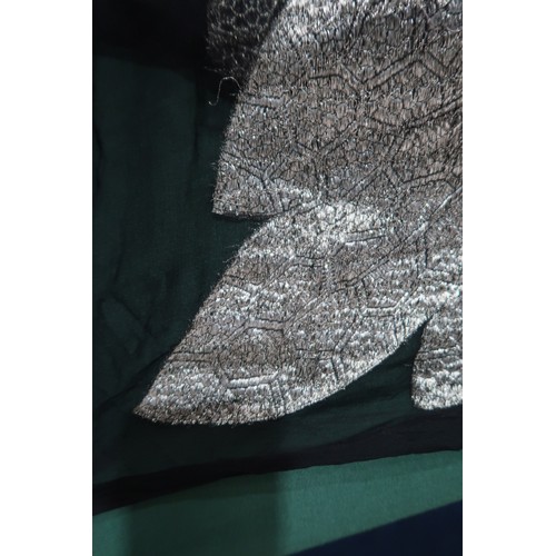 8020 - *Amended* A 1920s fur trimmed black cape by Reville London, a black shawl with silver lamé leaf-patt... 