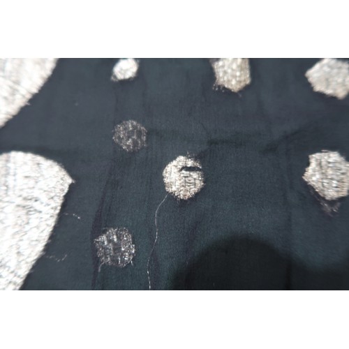8020 - *Amended* A 1920s fur trimmed black cape by Reville London, a black shawl with silver lamé leaf-patt... 