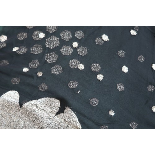 8020 - *Amended* A 1920s fur trimmed black cape by Reville London, a black shawl with silver lamé leaf-patt... 