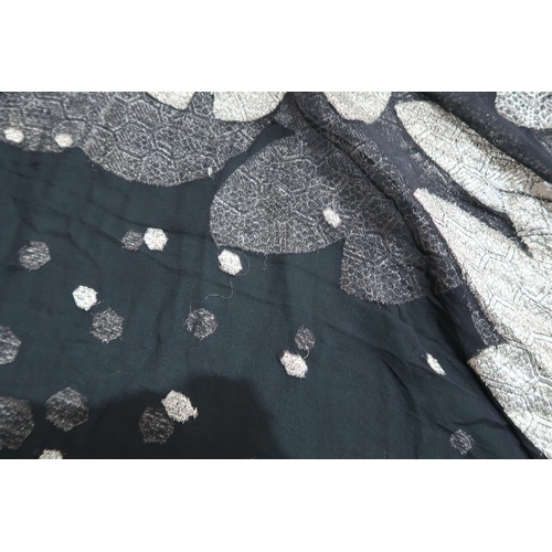 8020 - *Amended* A 1920s fur trimmed black cape by Reville London, a black shawl with silver lamé leaf-patt... 