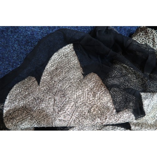 8020 - *Amended* A 1920s fur trimmed black cape by Reville London, a black shawl with silver lamé leaf-patt... 