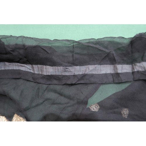 8020 - *Amended* A 1920s fur trimmed black cape by Reville London, a black shawl with silver lamé leaf-patt... 