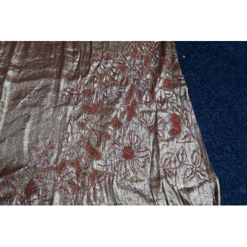 8020 - *Amended* A 1920s fur trimmed black cape by Reville London, a black shawl with silver lamé leaf-patt... 