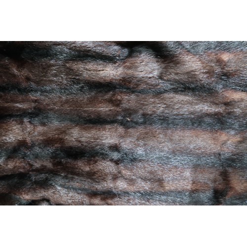 8036 - A long golden coloured fur coat and two dark brown fur coats (3)
