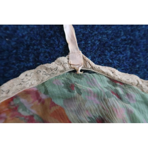 8017 - Vintage undergarments and nightwear comprising a yellow chiffon lace trimmed chemise and similar cam... 