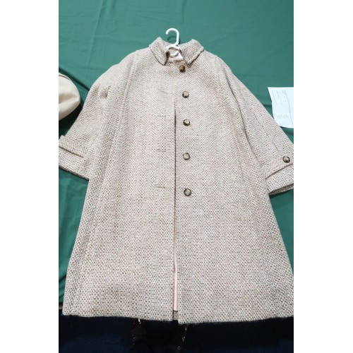 8058 - Vintage Aquascutum ladieswear comprising a light beige cashmere coat with matching belt and pink sat... 