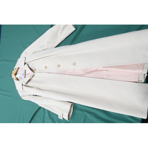8058 - Vintage Aquascutum ladieswear comprising a light beige cashmere coat with matching belt and pink sat... 
