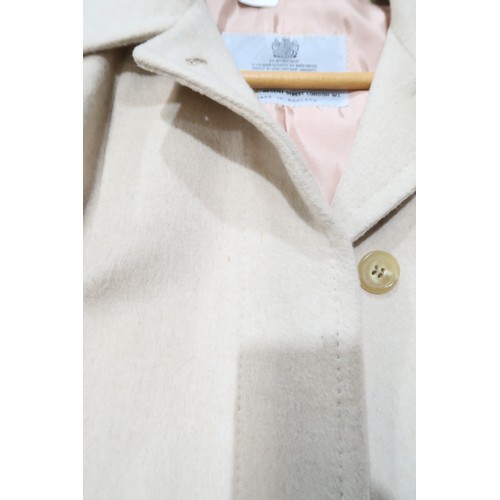 8058 - Vintage Aquascutum ladieswear comprising a light beige cashmere coat with matching belt and pink sat... 
