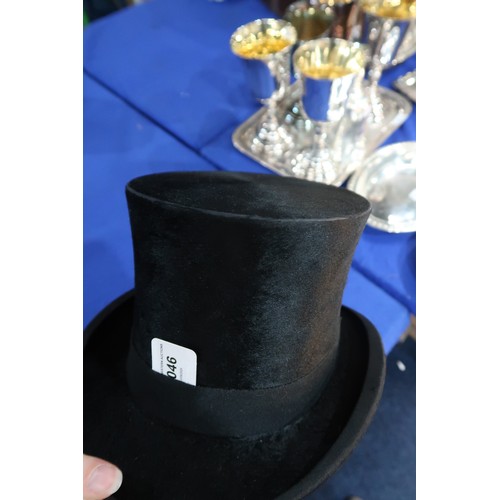 8046 - A Lincoln Bennett silk top hat of large proportions, measuring 20.1cm front-to-back internally, 16.5... 