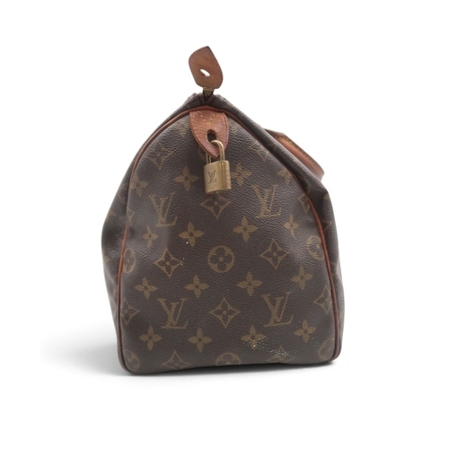 8023 - A vintage Louis Vuitton Speedy 30 handbag in monogrammed coated canvas with vachetta leather trims