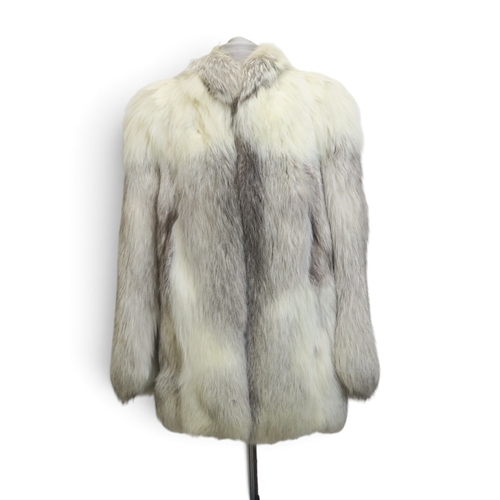 8017 - A white fur jacket and a Bazar de Christian Lacroix linen long jacket (2)