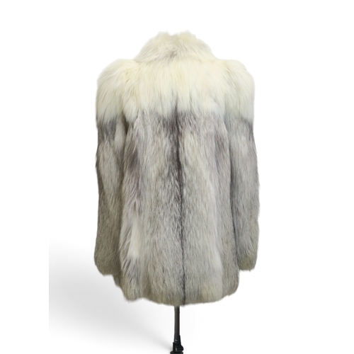 8017 - A white fur jacket and a Bazar de Christian Lacroix linen long jacket (2)
