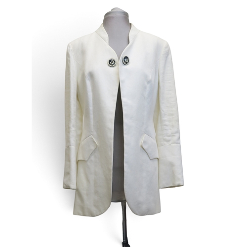 8017 - A white fur jacket and a Bazar de Christian Lacroix linen long jacket (2)
