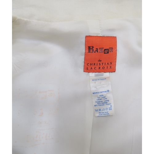 8017 - A white fur jacket and a Bazar de Christian Lacroix linen long jacket (2)