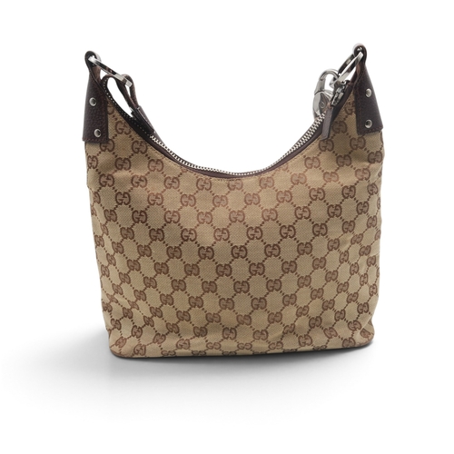 8029 - A Gucci GG shoulder bag in monogram jacquard canvas with brown leather trims and strap and silver-to... 