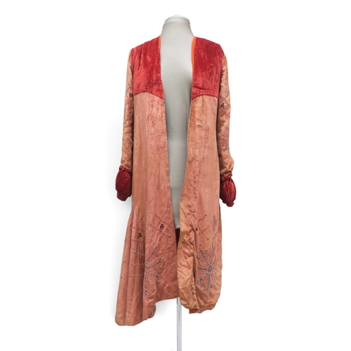 8044 - A pink velvet opera coat embroidered with beads and rhinestones, with gathered padded cuffs and yoke... 