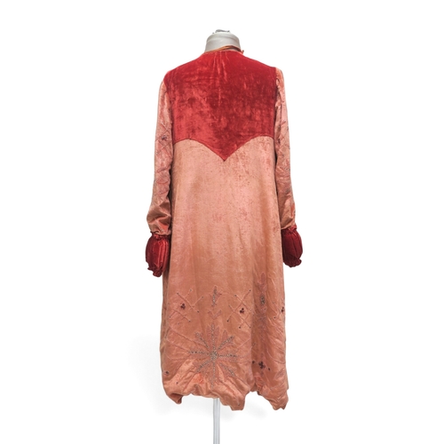 8044 - A pink velvet opera coat embroidered with beads and rhinestones, with gathered padded cuffs and yoke... 