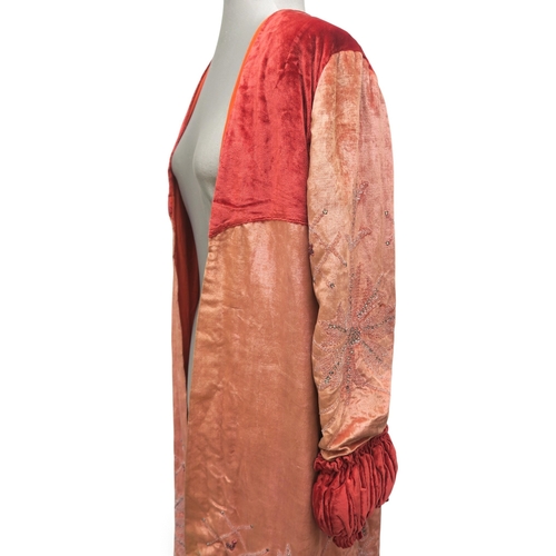 8044 - A pink velvet opera coat embroidered with beads and rhinestones, with gathered padded cuffs and yoke... 