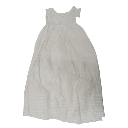 A collection of linens including embroidered and lace table linen, a ...