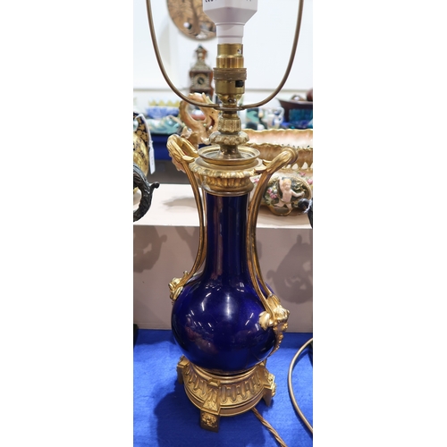 A pair of Maitland Smith table lamps of classical design, together with ...