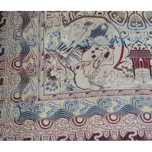 A brocade coverlet woven with vignettes of Japanese figures around a ...