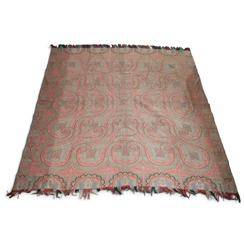 A brocade coverlet woven with vignettes of Japanese figures around a ...