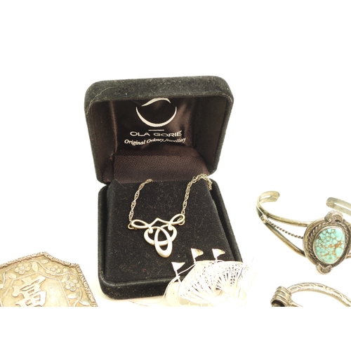 A first nation white metal turquoise bangle, a silver Ola Gorie pendant ...
