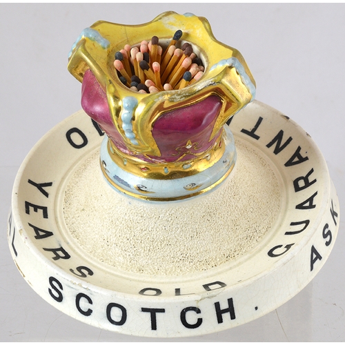 126 - BARNEYS ROYAL SCOTCH MATCHSTRIKER. 4ins tall, multicoloured, elaborate crown matcholder (re-glued), ... 