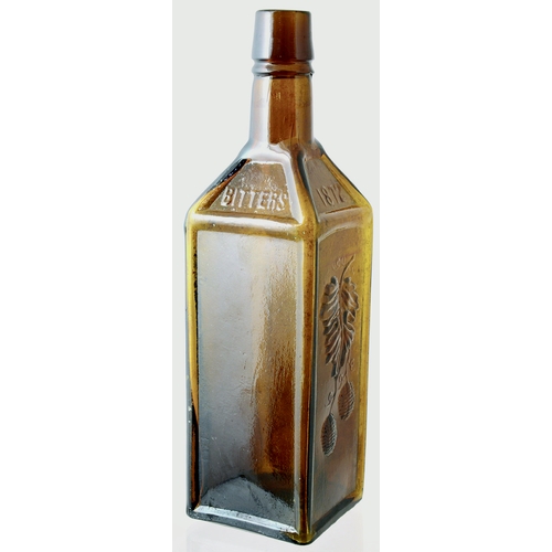 160 - DR SOULES BOTTLE. 9.75ins tall, amber glass square shape. 4 facetted panels one with large embossed ... 