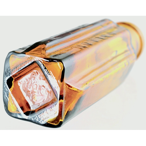 169 - ETON STAR POISON. (DP pg 58) 3.5ins tall, amber glass. POISON/ NOT TO BE TAKEN embossed vertically. ... 