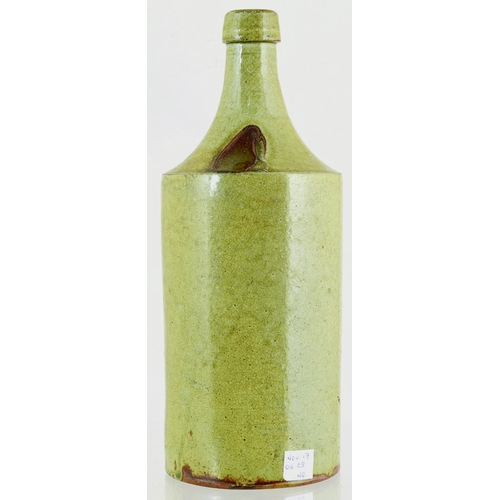 185 - LOUTH PORTER BOTTLE. 10.75ins tall, grey/ green slip glaze porter. Front impressed WARRANTED FULL IM... 