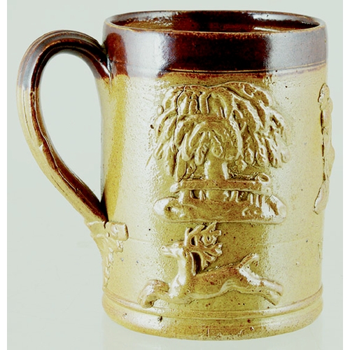 190 - SALT GLAZE MUG. 4ins tall, t.t. handled mug with raised sprigs, windmill, toper, hounds, deer etc. &... 