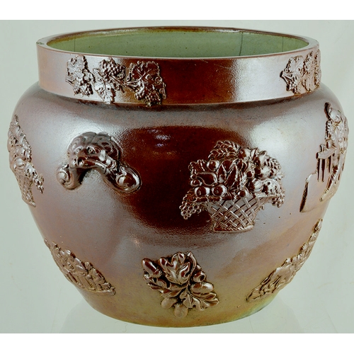 196 - SALT GLAZE JARDINERE. 9.5ins tall, shiny tan salt glaze with applied sprigging all round, fruit bask... 