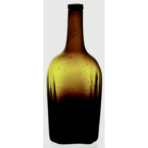 215 - FREEBLOWN OCTAGONAL WINE BOTTLE. 10.5ins tall. Dark green/ black glass. Flattened rectangular form w... 