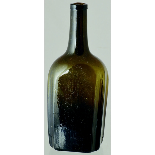 215 - FREEBLOWN OCTAGONAL WINE BOTTLE. 10.5ins tall. Dark green/ black glass. Flattened rectangular form w... 