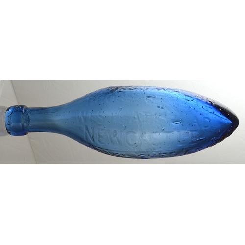 37 - ELANDS NEWCASTLE HAMILTON. 9.25ins long, cobalt blue glass. Embossed G ELANDS/ POTASS WATER/ CROSS S... 