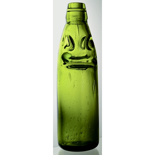 51 - NIAGRA PATENT CODD BOTTLE. 9ins tall, pale green/ amber glass 10oz codd bottle. Weakly embossed CODD... 