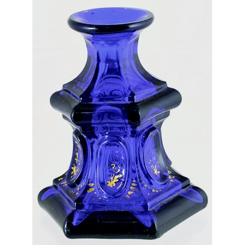 60 - DECORATIVE FACETTED INKWELL. 3.5ins tall, cobalt blue glass with gold highlights (some wear). Ground... 