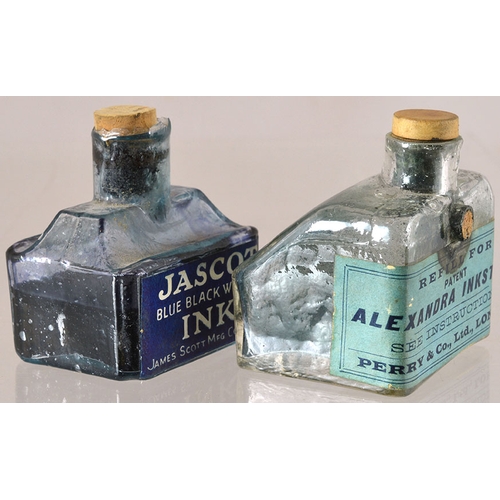 64 - PAIR OF LABELLED INKS. Aqua glass, both with cork stoppers. One for JASCOT INK, boat shaped, pen res... 