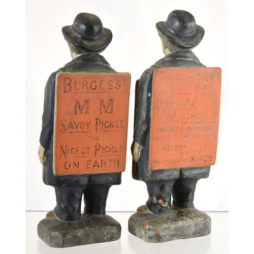 84 - PAIR OF BURGESS’S ANCHOVY PASTE ADVERTISING FIGURES. 8ins tall,  clay pottery figures of man holding... 