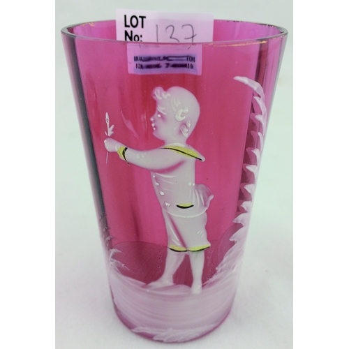 137 - CRANBERRY GLASS BEAKER. 3.5ins, little boy holding flower in white & yellow.