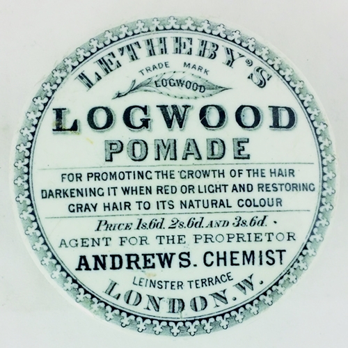 216 - LETHERBY’S/ LOGWOOD/ POMADE POT LID. 3.1ins diam. Varied 13 lines of black transferred lettering & p... 