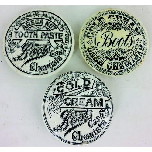 218 - BOOTS POT LID TRIO. Largest 2.8ins diam. Two COLD CREAM variants plus a TOOTH PASTE lid. (3)