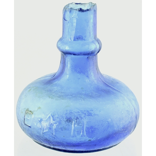 580 - PALE COBALT BLUE LAMP. 3.5ins tall to top of sheared lip. Embossed STAR LAMP one side, E (star pict.... 