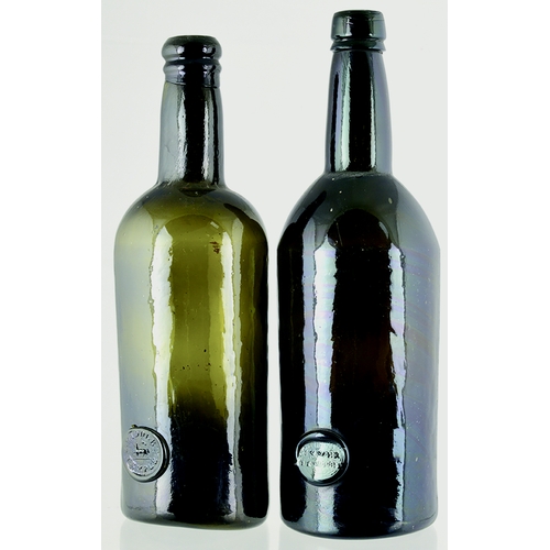 722 - PAIR OF SEALED WINE BOTTLES. Tallest 11.75ins, both cylindrical, rounded shoulders, low body seals. ... 