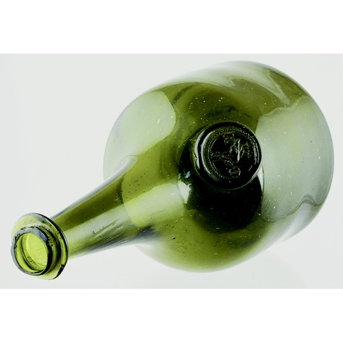 726 - SEALED WINE BOTTLE. 9ins tall. Dark green glass, extremely elegant long tapering neck mallet form wi... 