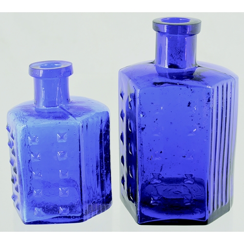 19 - Hexagonal Poison Duo. Tallest 4.5ins ins. Cobalt blue glass, (largest is darker) vertical ribbing to... 