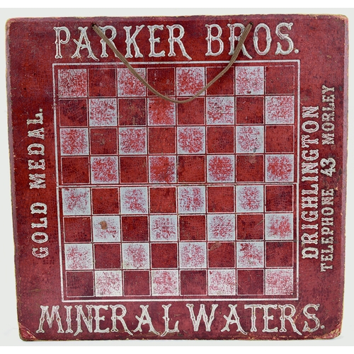 43 - PARKER BROS MINERAL WATERS CHESS STYLE ADVERTISING BOARD. 13.5ins diam, red & silver lettering aroun... 