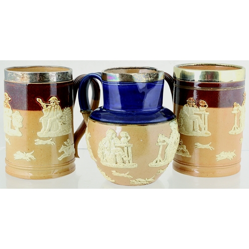 53 - DOULTON SPRIGGED JUG TRIO. Tallest 5.2ins, 2 brown top, lower tan, both with body cracks, plus one b... 